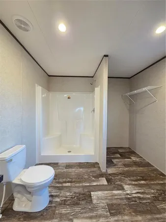 a view of a yard with large trees