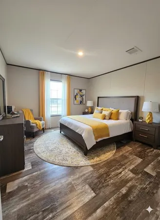 a view of a livingroom with wooden floor