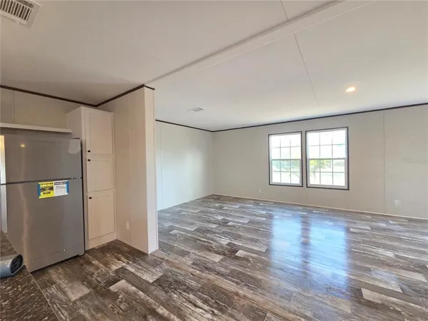 a view of livingroom with hardwood floor and window