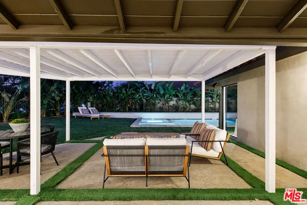 a outdoor living room with furniture