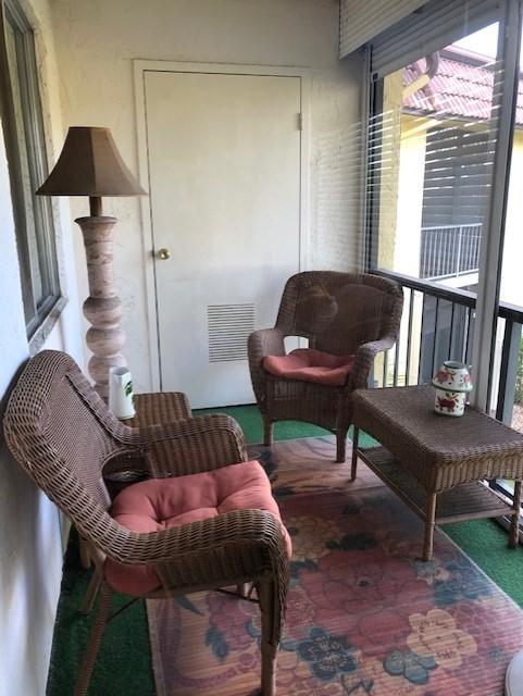 818 Southwest 9th St Circle, Unit 201 Boca Raton, FL 33486 - Photo 12 of 21 Screen porch