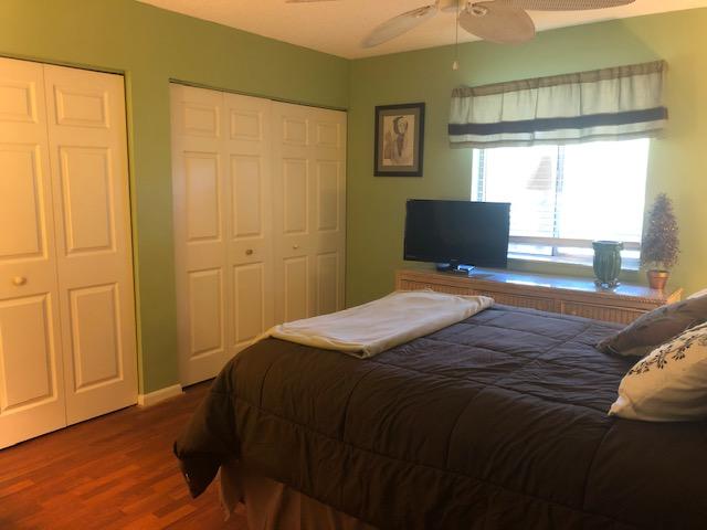 818 Southwest 9th St Circle, Unit 201 Boca Raton, FL 33486 - Photo 8 of 21 Master bedroom