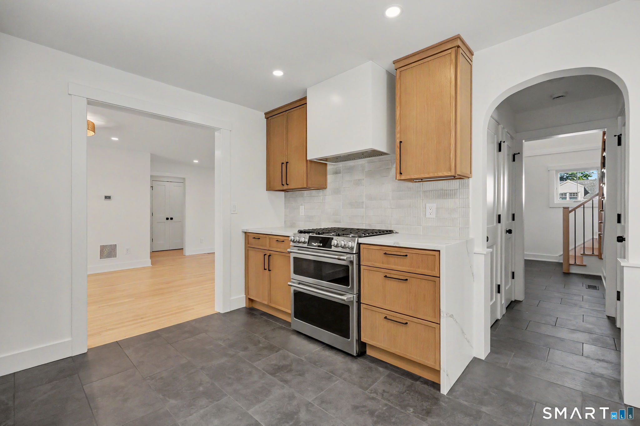 91 Lockwood Road Fairfield, CT 06825 - Photo 12 of 38 a view of a kitchen with electric appliances