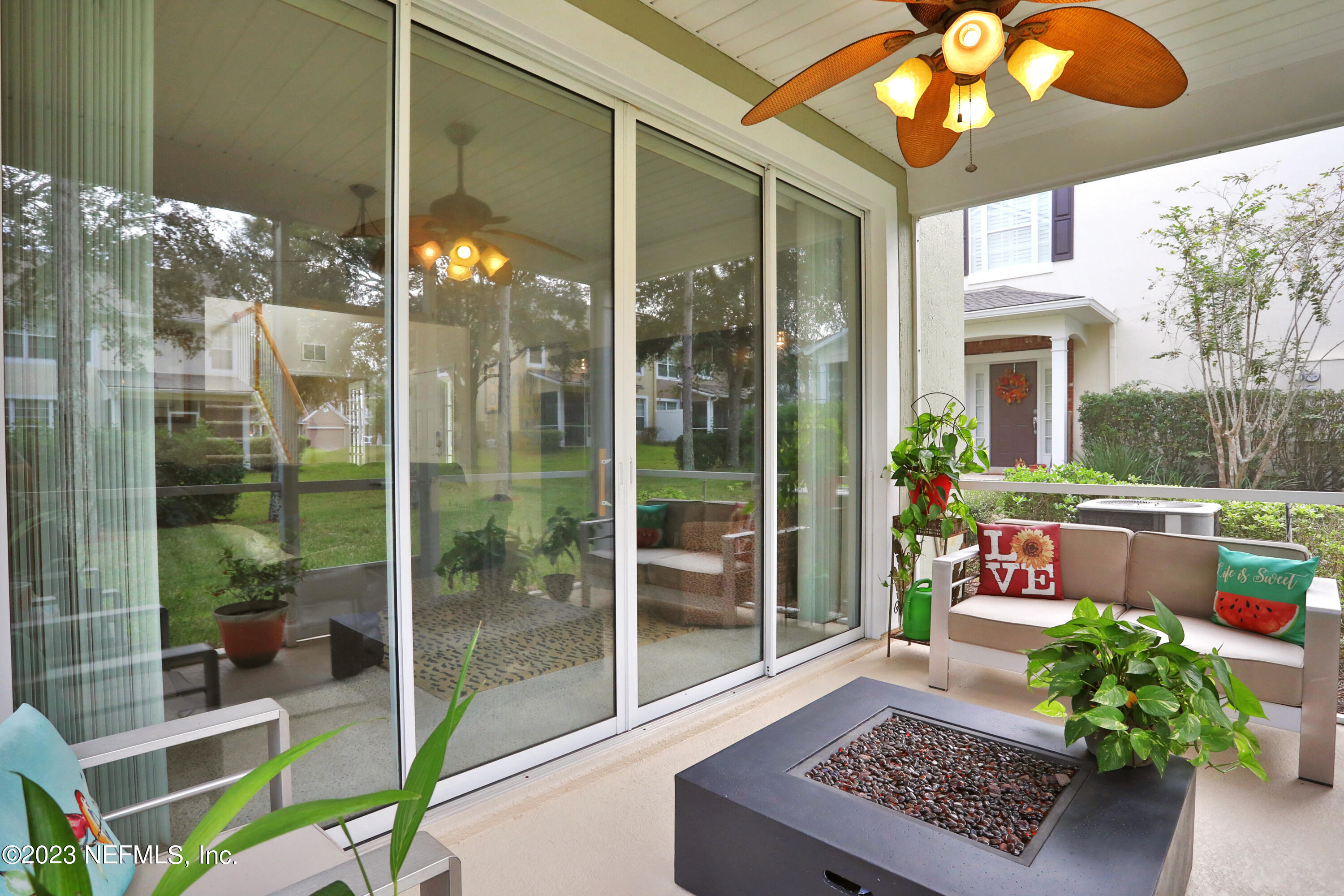6488 May Tree Court Jacksonville, FL 32258 - Photo 8 of 36 Slider to Screened Porch