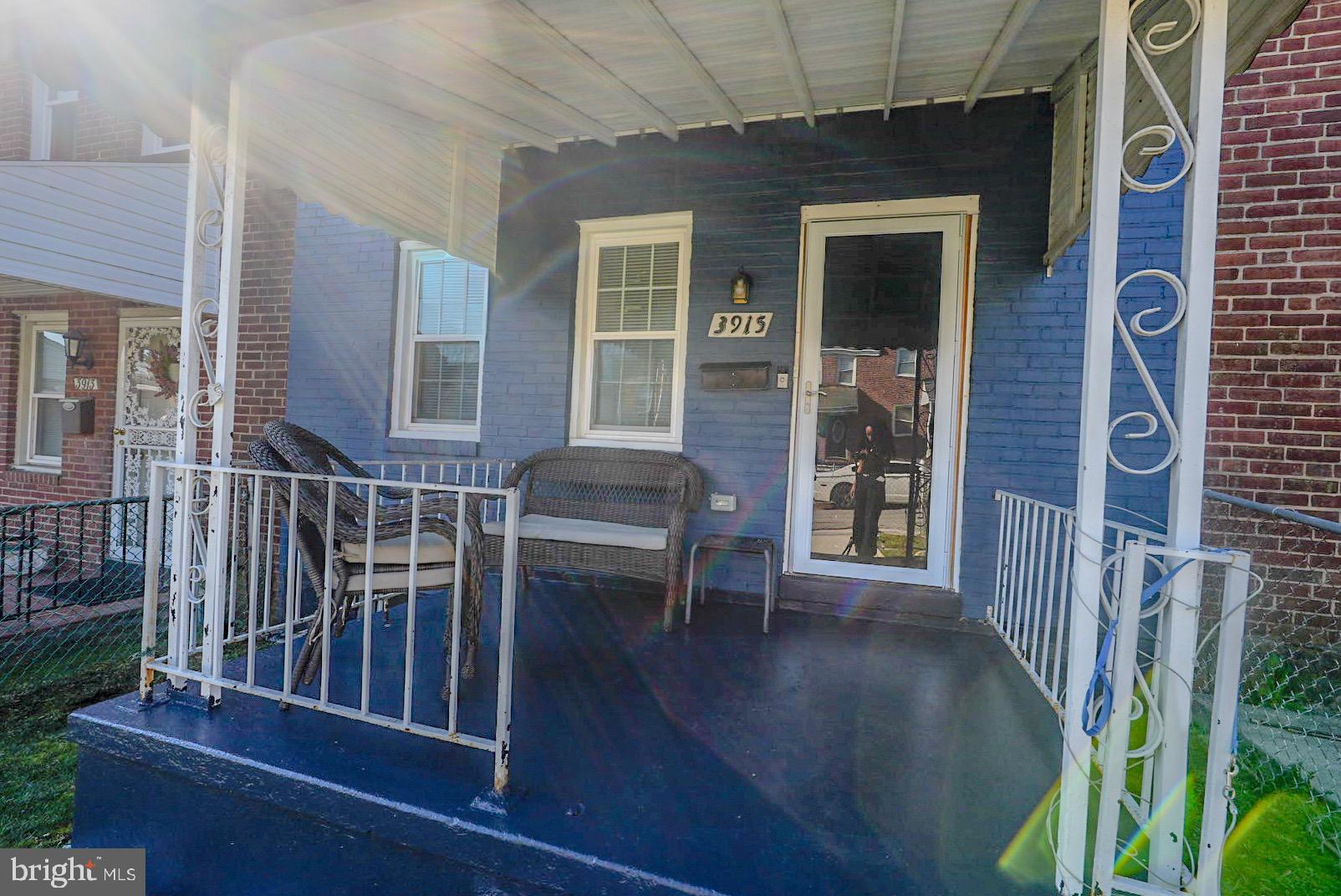 3915 Flowerton Road Baltimore, MD 21229 - Photo 17 of 17 a view of a balcony with chairs