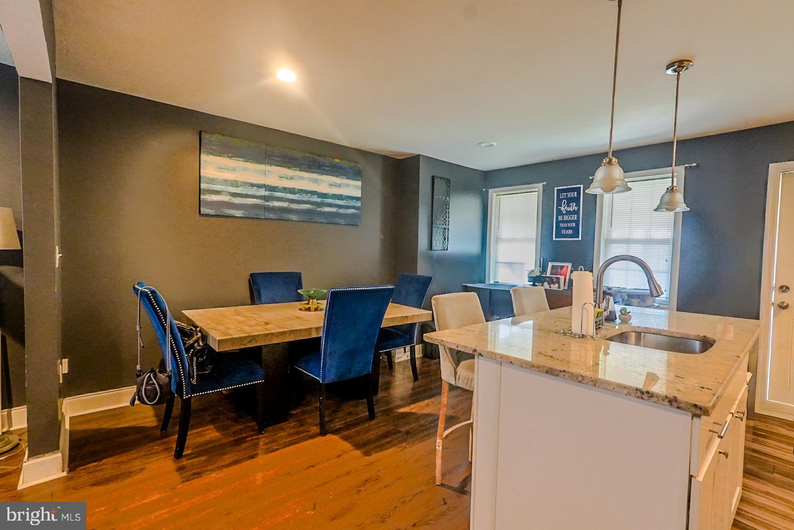 3915 Flowerton Road Baltimore, MD 21229 - Photo 5 of 17 a view of a dining room with furniture