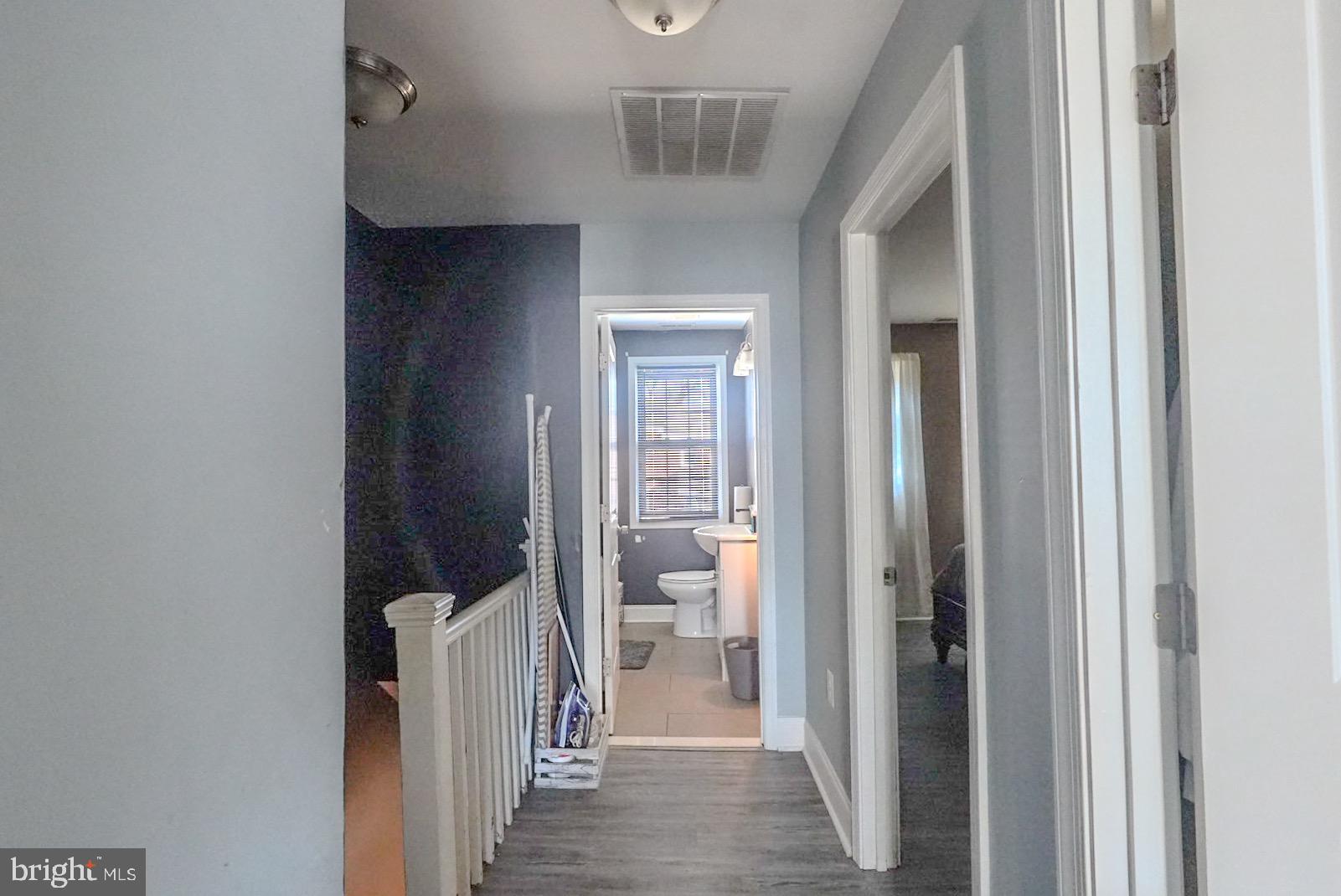 3915 Flowerton Road Baltimore, MD 21229 - Photo 10 of 17 a view of a hallway with a livingroom and entryway