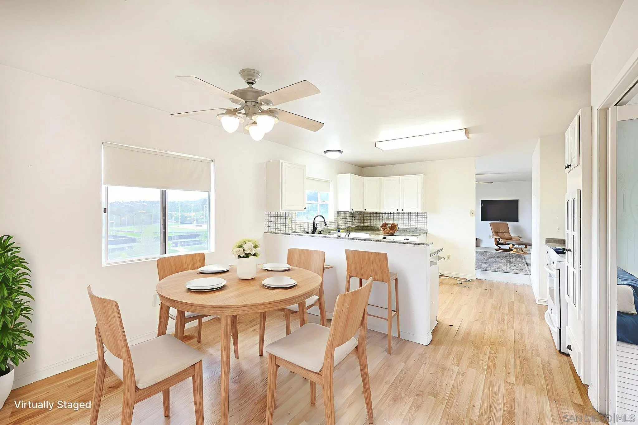 221 Colina Terrace Vista, CA 92084 - Photo 18 of 57 a view of a dining room with furniture and wooden floor