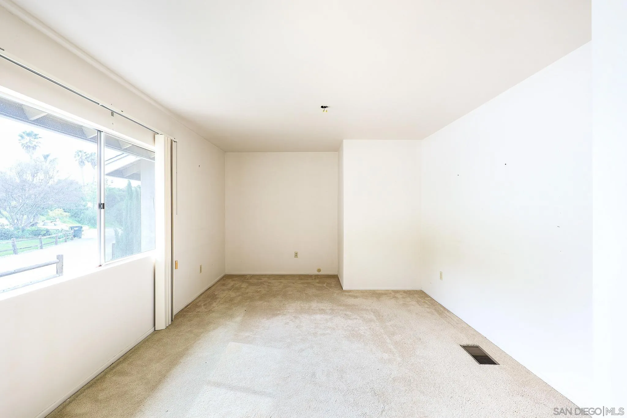 221 Colina Terrace Vista, CA 92084 - Photo 25 of 57 a view of an empty room with a window