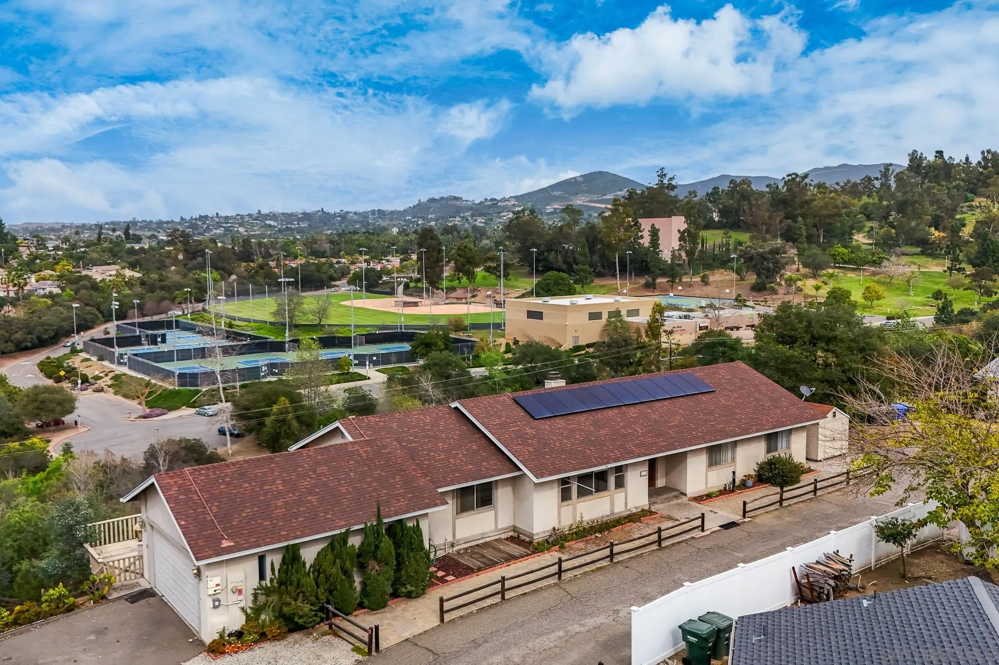 221 Colina Terrace Vista, CA 92084 - Photo 51 of 57 an aerial view of house with yard swimming pool and mountains