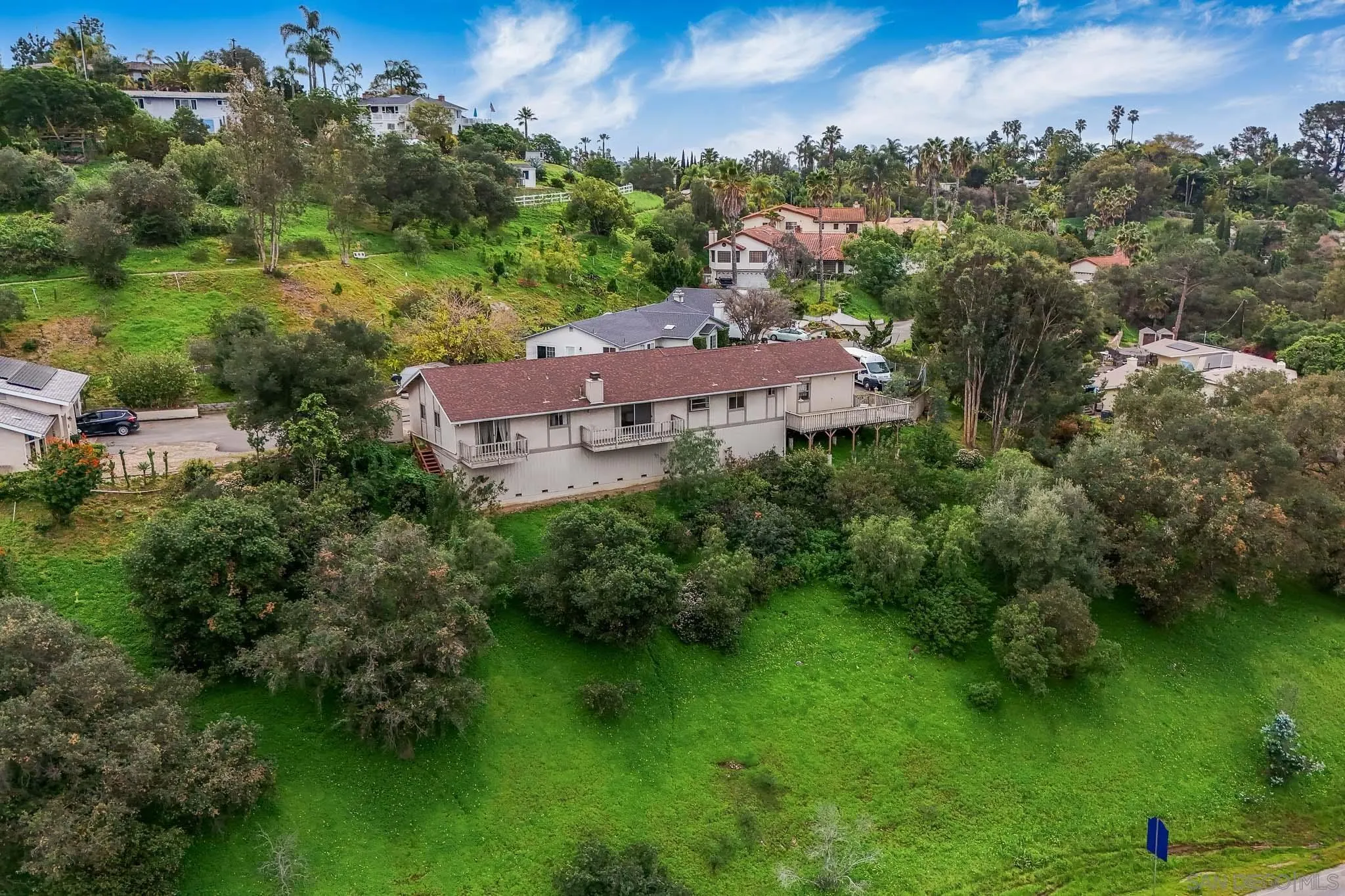 221 Colina Terrace Vista, CA 92084 - Photo 56 of 57 an aerial view of a house with a yard basket ball court and outdoor seating