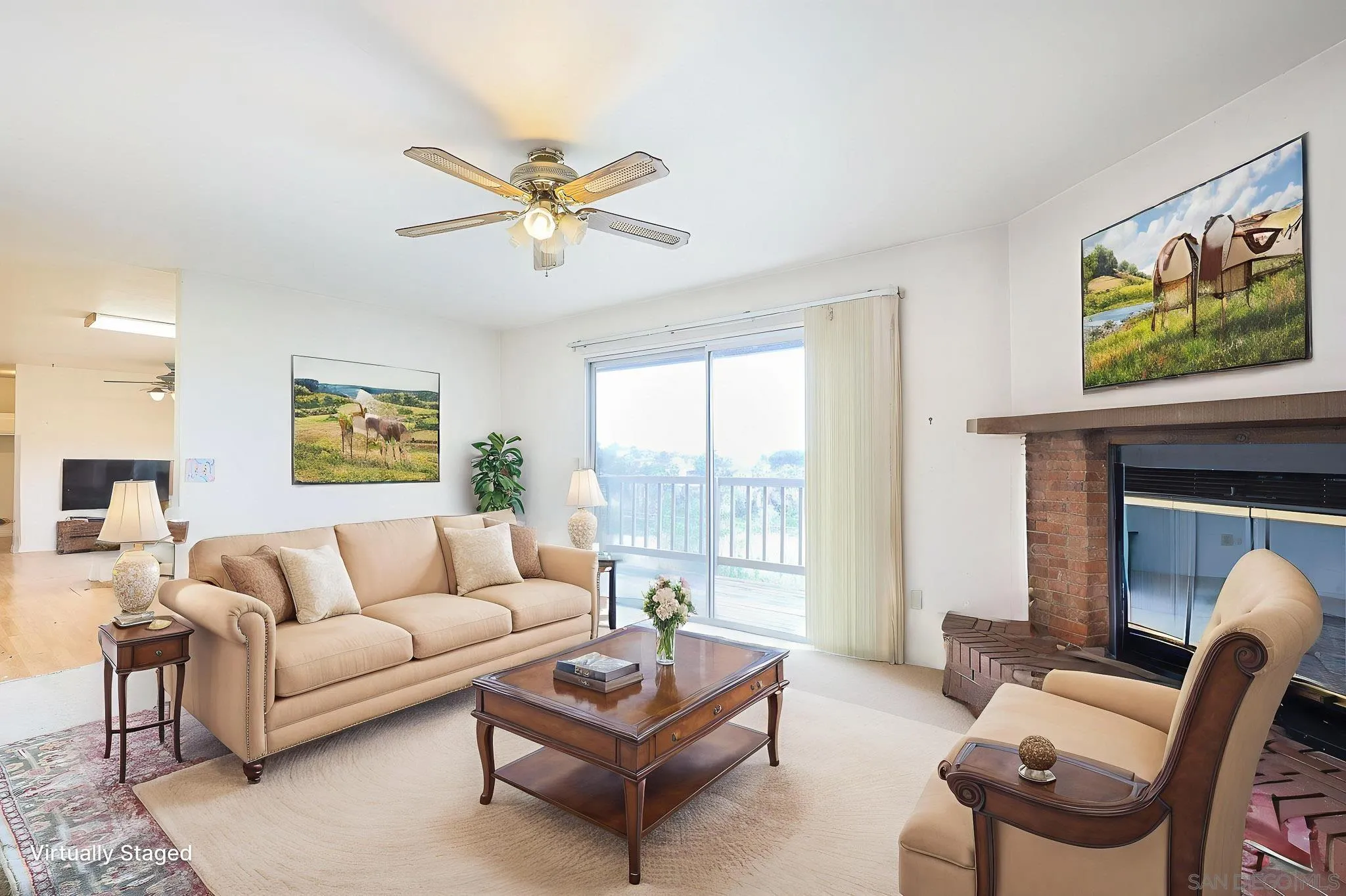 221 Colina Terrace Vista, CA 92084 - Photo 9 of 57 a living room with furniture a fireplace and a flat screen tv