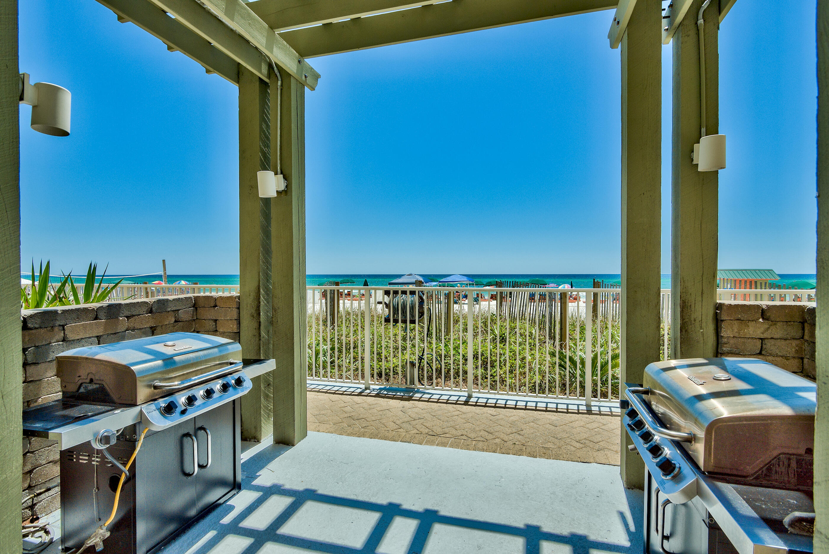 17545 Front Beach Road, Unit 1104 Panama City Beach, FL 32413 - Photo 26 of 31 a view of a balcony with furniture and front door