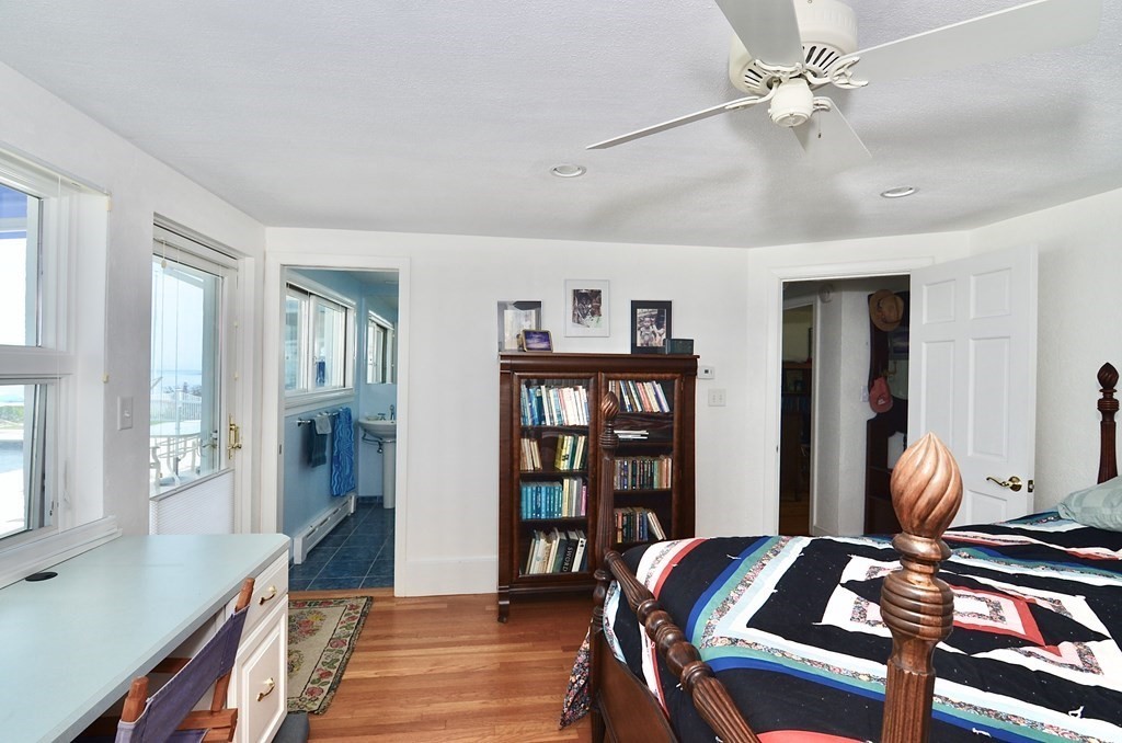 53 Harborview Road Hull, MA 02045 - Photo 13 of 21 a view of a workspace with furniture and a window