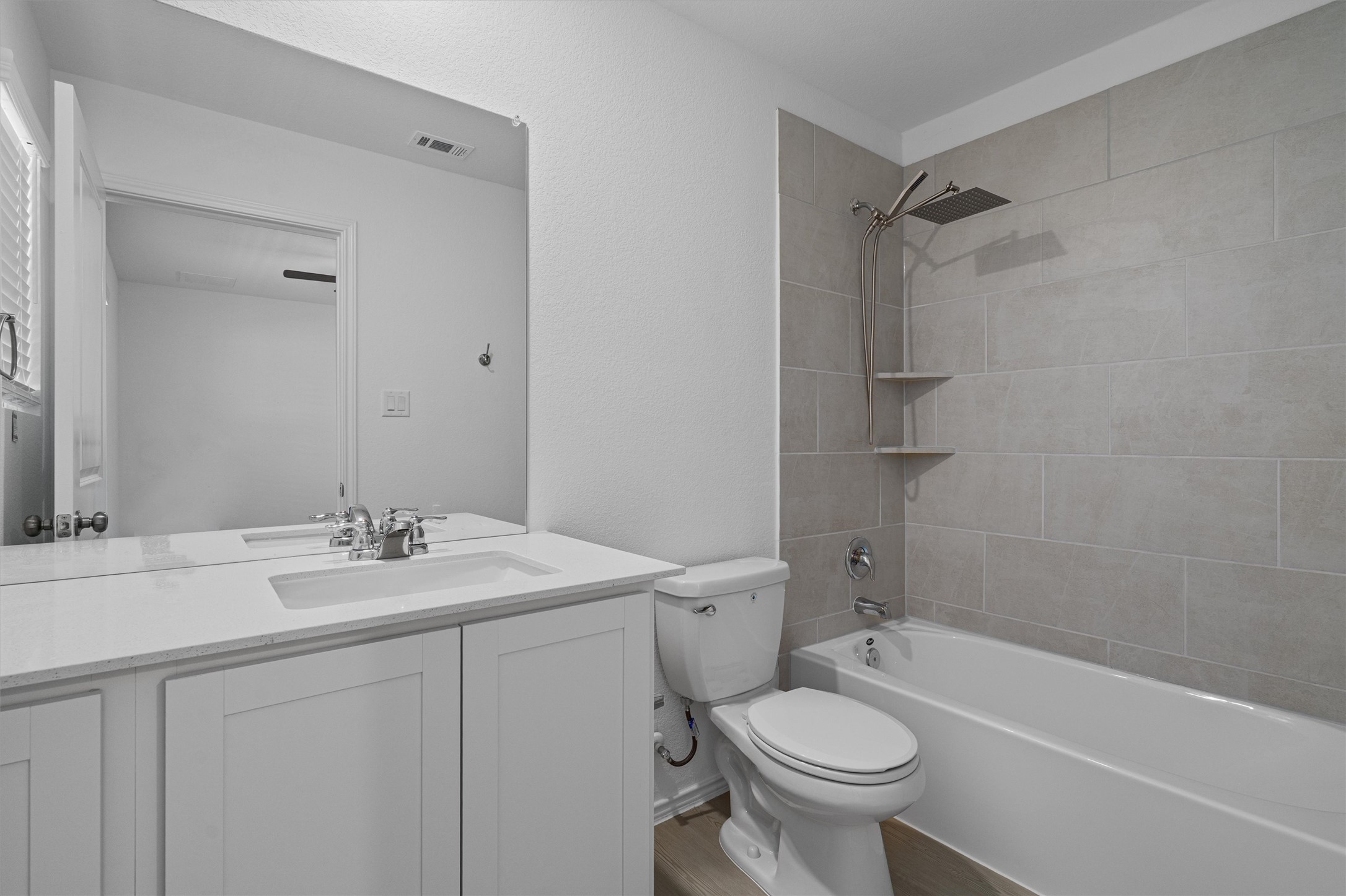 3305 Everett Kyle, TX 78640 - Photo 12 of 21 Guest Bathroom with vanity, tub / shower combination,