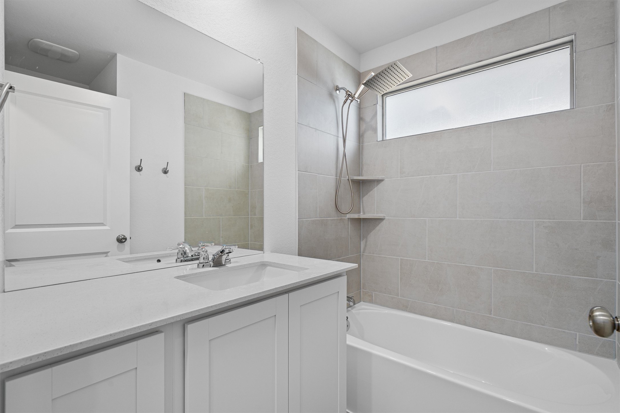 3305 Everett Kyle, TX 78640 - Photo 17 of 21 Guest full bathroom with vanity and shower combination