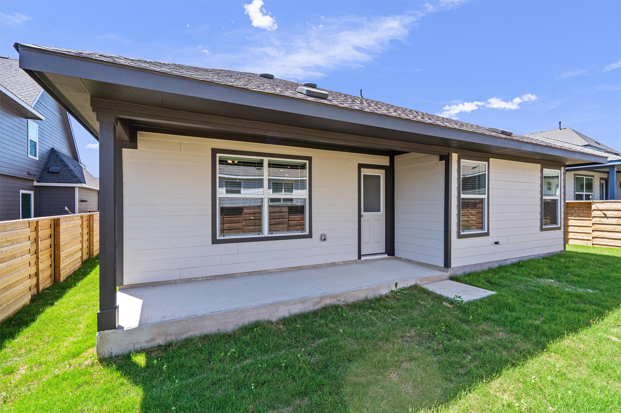 3305 Everett Kyle, TX 78640 - Photo 19 of 21 Rear view of house with a patio area