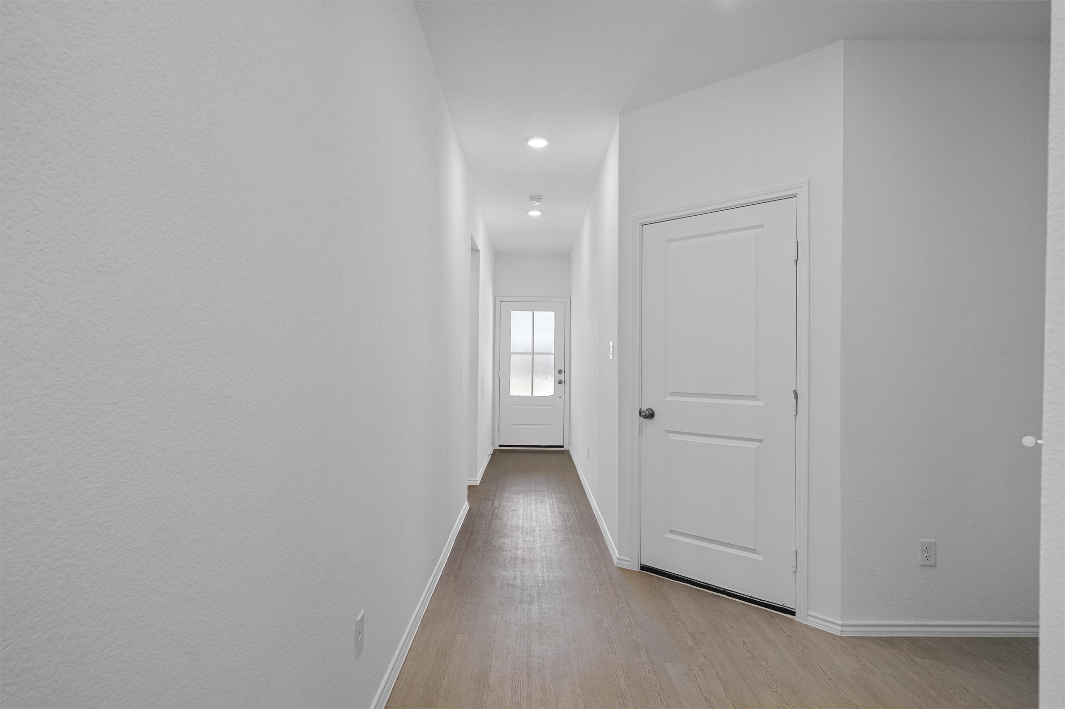 3305 Everett Kyle, TX 78640 - Photo 4 of 21 Hall with light finished floors and recessed lighting