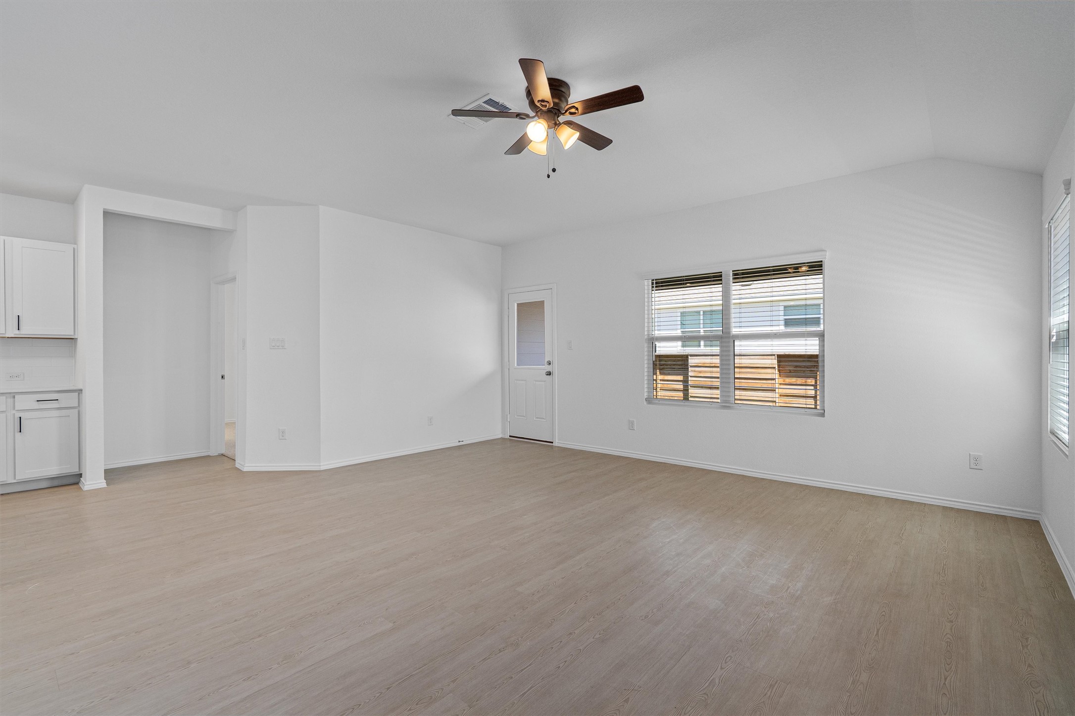 3305 Everett Kyle, TX 78640 - Photo 6 of 21 living room featuring a ceiling fan, and vaulted ceiling