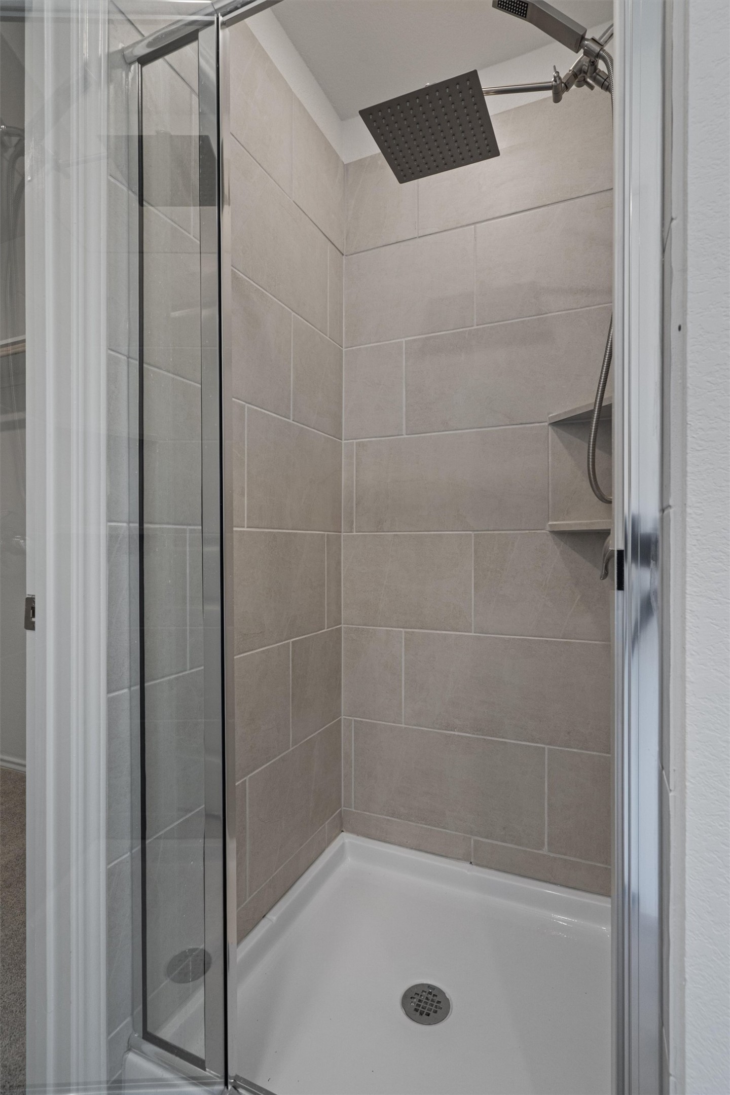 3305 Everett Kyle, TX 78640 - Photo 9 of 21 Primary Bathroom with a stall shower and rainfall showerhead