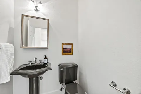 a bathroom with a sink and a toilet