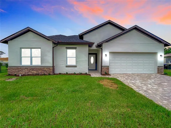 front view of house with a yard