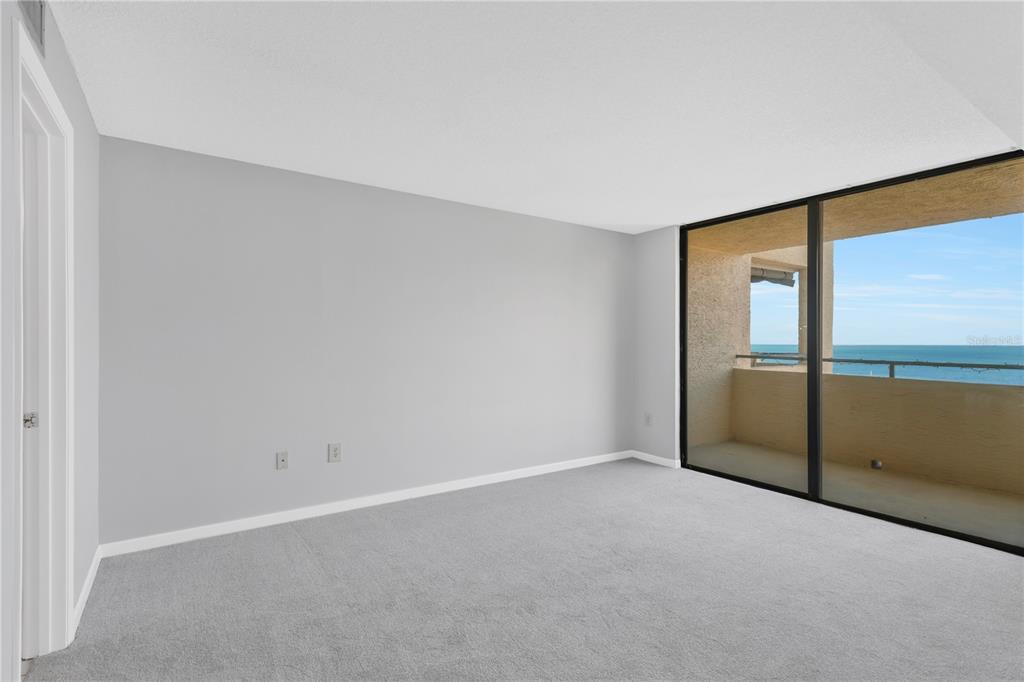 6009 Sea Ranch Drive, Unit 705 Hudson, FL 34667 - Photo 15 of 43 a view of an empty room with a window
