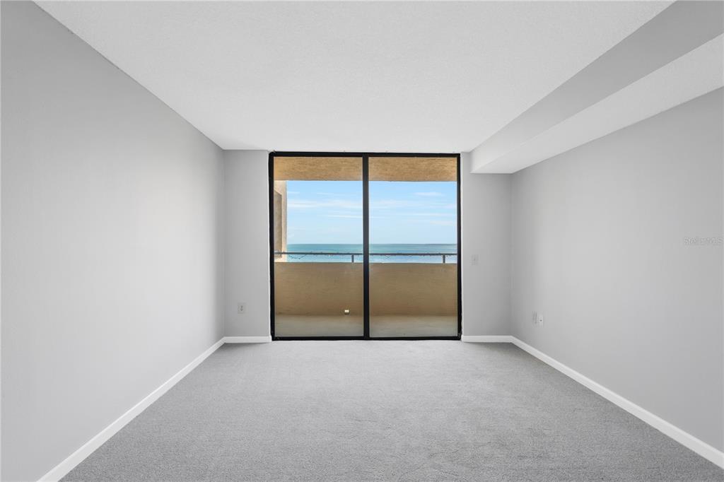 6009 Sea Ranch Drive, Unit 705 Hudson, FL 34667 - Photo 17 of 43 a view of an empty room with a window