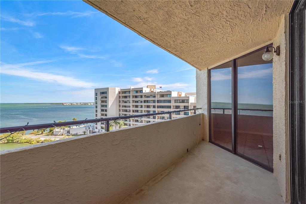 6009 Sea Ranch Drive, Unit 705 Hudson, FL 34667 - Photo 19 of 43 a view of balcony with furniture