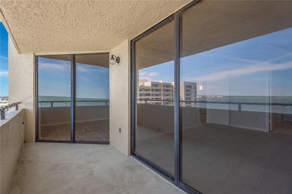 6009 Sea Ranch Drive, Unit 705 Hudson, FL 34667 - Photo 20 of 43 a view of a glass door