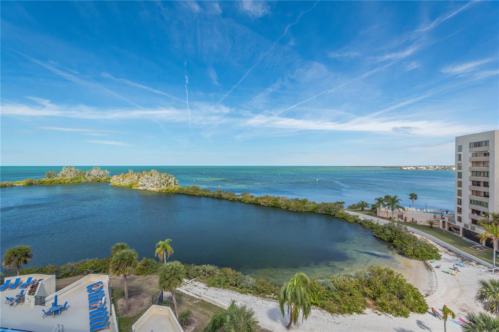 6009 Sea Ranch Drive, Unit 705 Hudson, FL 34667 - Photo 24 of 43 a view of a city and ocean view
