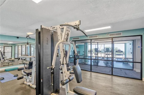 a view of a room with gym equipment