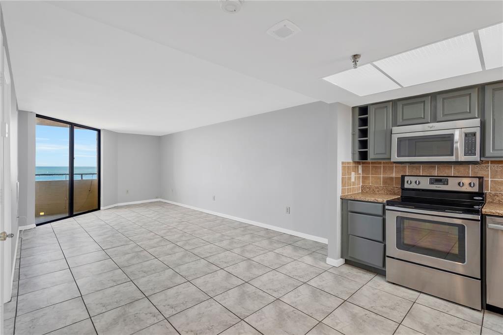 6009 Sea Ranch Drive, Unit 705 Hudson, FL 34667 - Photo 4 of 43 an empty room with windows