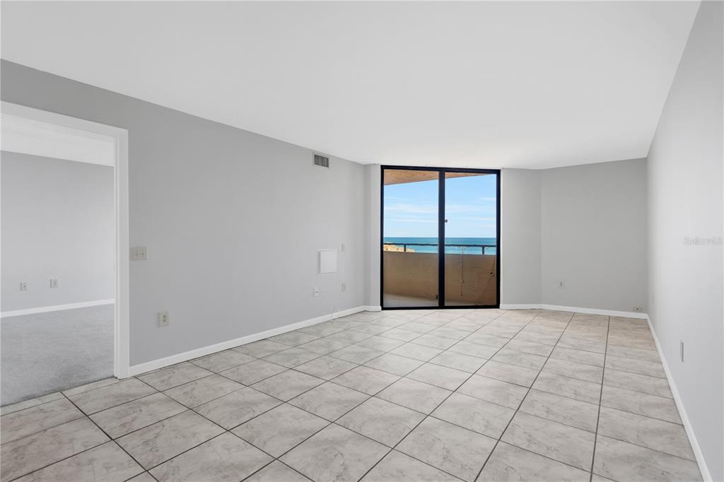 6009 Sea Ranch Drive, Unit 705 Hudson, FL 34667 - Photo 8 of 43 a view of an empty room with a window