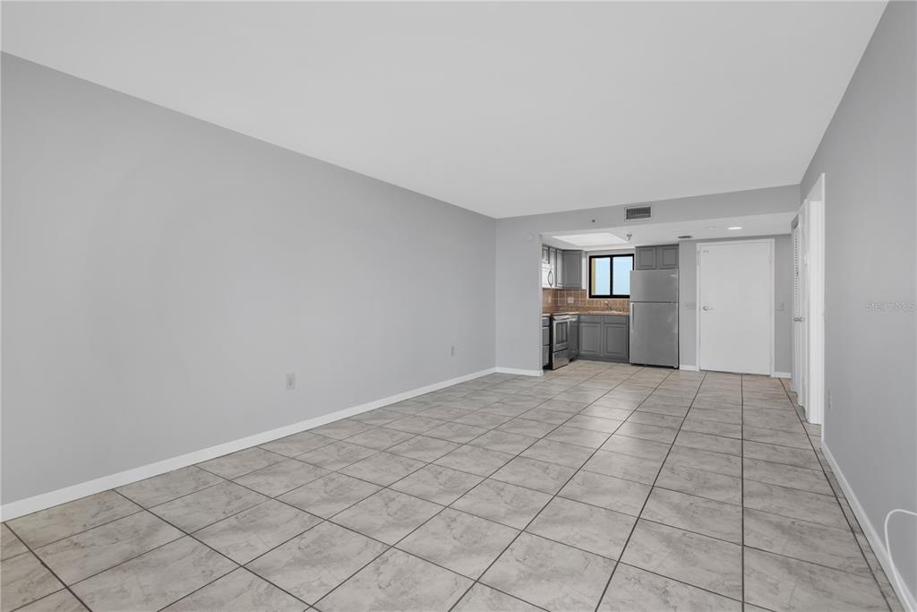 6009 Sea Ranch Drive, Unit 705 Hudson, FL 34667 - Photo 9 of 43 a view of empty room with wooden floor