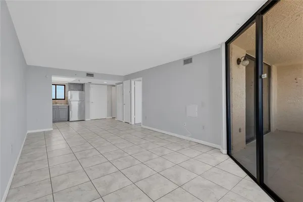 a view of an empty room and window