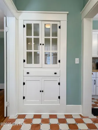 a view of walk in closet with window