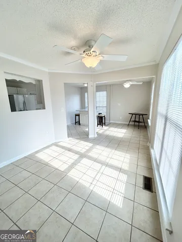 a room with furniture and window