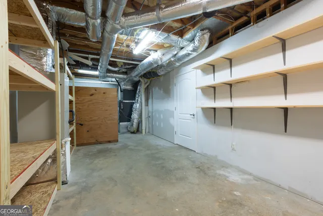 a view of a lake with a bench in front of it