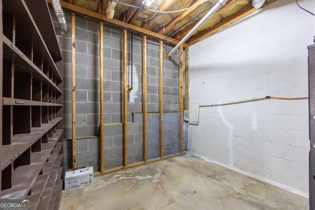 a balcony with wooden floor and city view