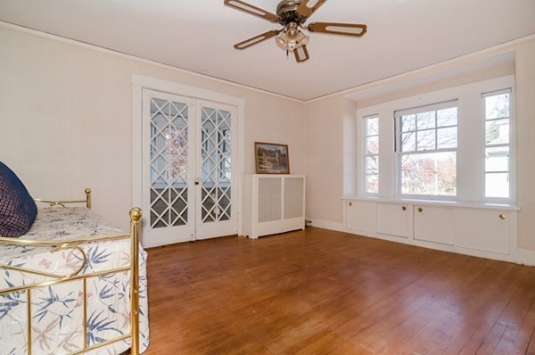86 Warren Street Needham, MA 02492 - Photo 16 of 24 a view of livingroom with furniture and a window