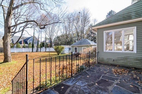 86 Warren Street Needham, MA 02492 - Photo 21 of 24 a view of a house with backyard and sitting area