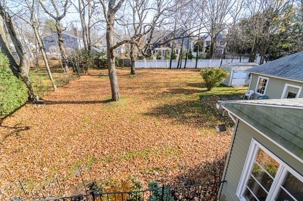 86 Warren Street Needham, MA 02492 - Photo 24 of 24 a backyard of a house with lots of green space