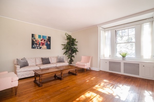 86 Warren Street Needham, MA 02492 - Photo 7 of 24 a living room with furniture and window