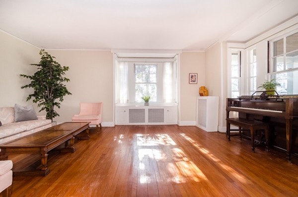 86 Warren Street Needham, MA 02492 - Photo 8 of 24 a bed room with a bed and a window