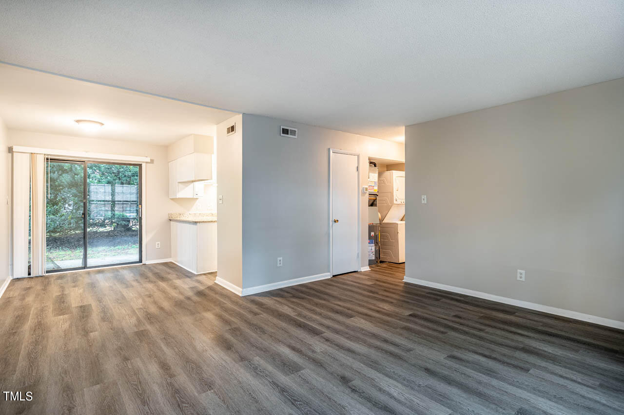 5808 Falls Of Neuse Road, Unit B Raleigh, NC 27609 - Photo 7 of 16 From living room looking to dining area