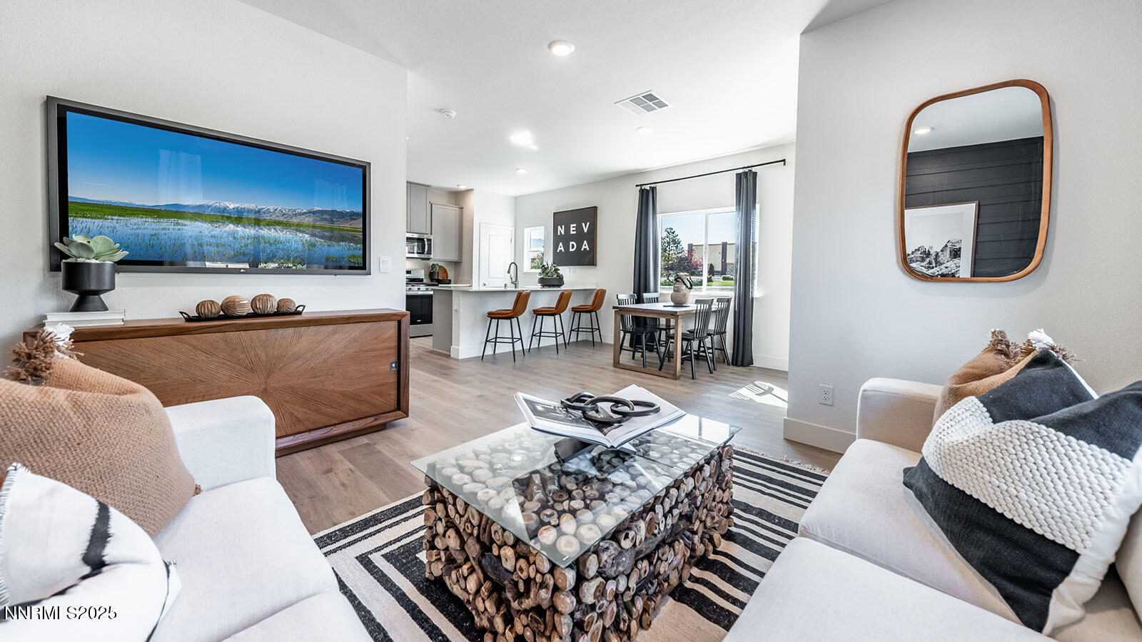 1615 Prancer Street, Unit LOT #53 Reno, NV 89523 - Photo 17 of 34 a living room with furniture and a flat screen tv
