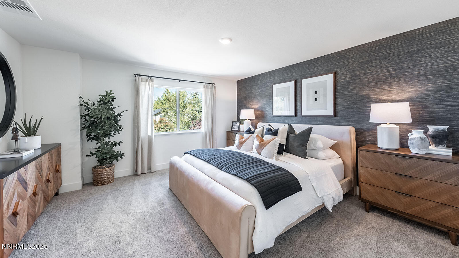 1615 Prancer Street, Unit LOT #53 Reno, NV 89523 - Photo 24 of 34 a bed room with a bed and a potted plant