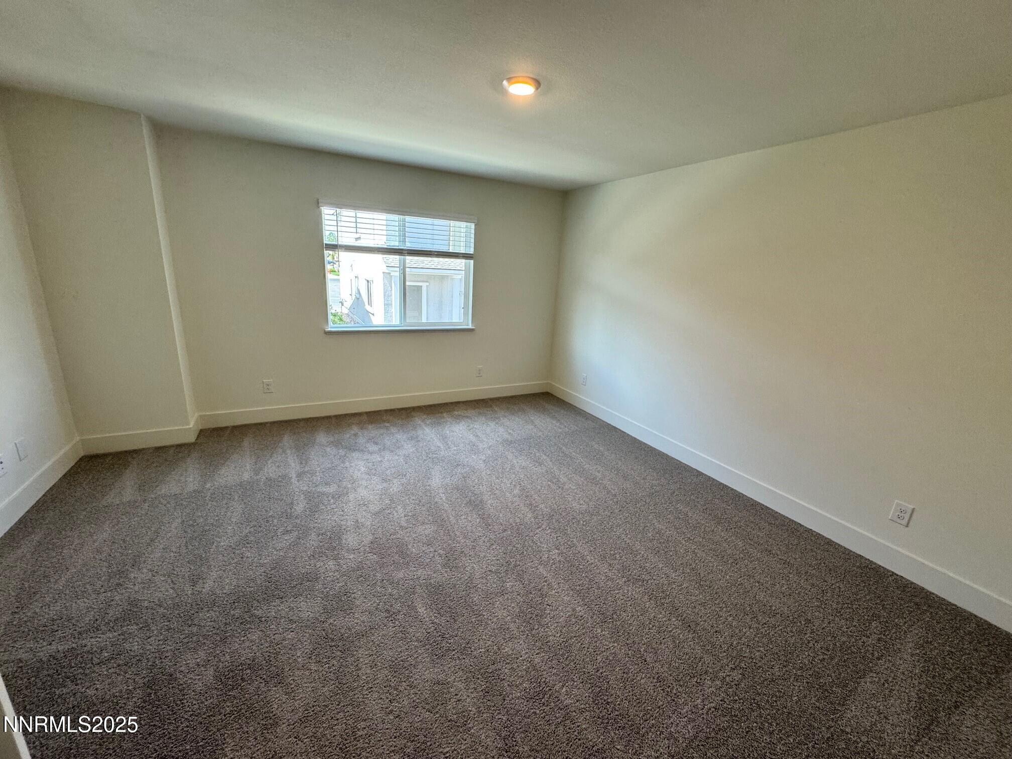 1615 Prancer Street, Unit LOT #53 Reno, NV 89523 - Photo 6 of 34 an empty room with a window