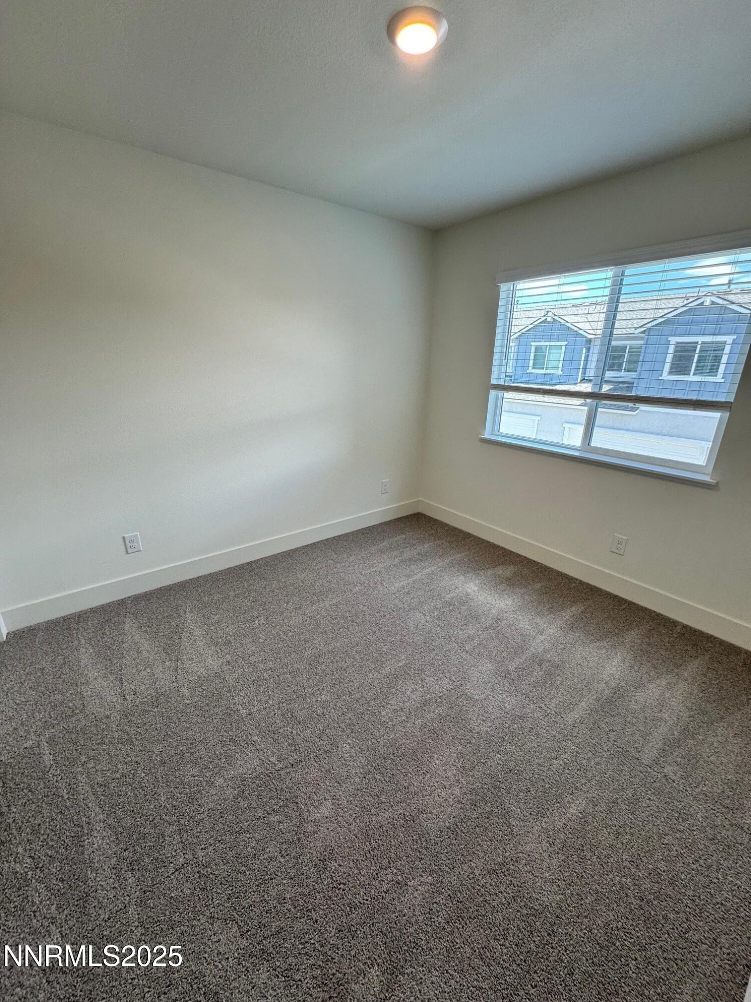 1615 Prancer Street, Unit LOT #53 Reno, NV 89523 - Photo 8 of 34 a view of an empty room with a window